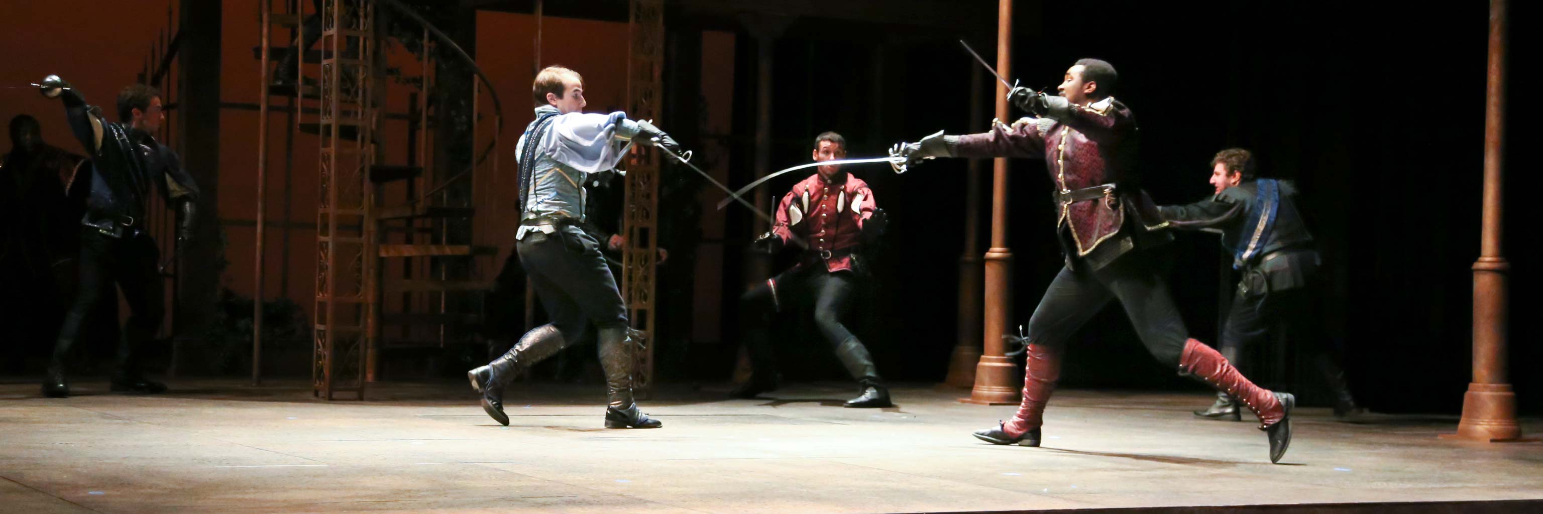 sword fighting during a performance