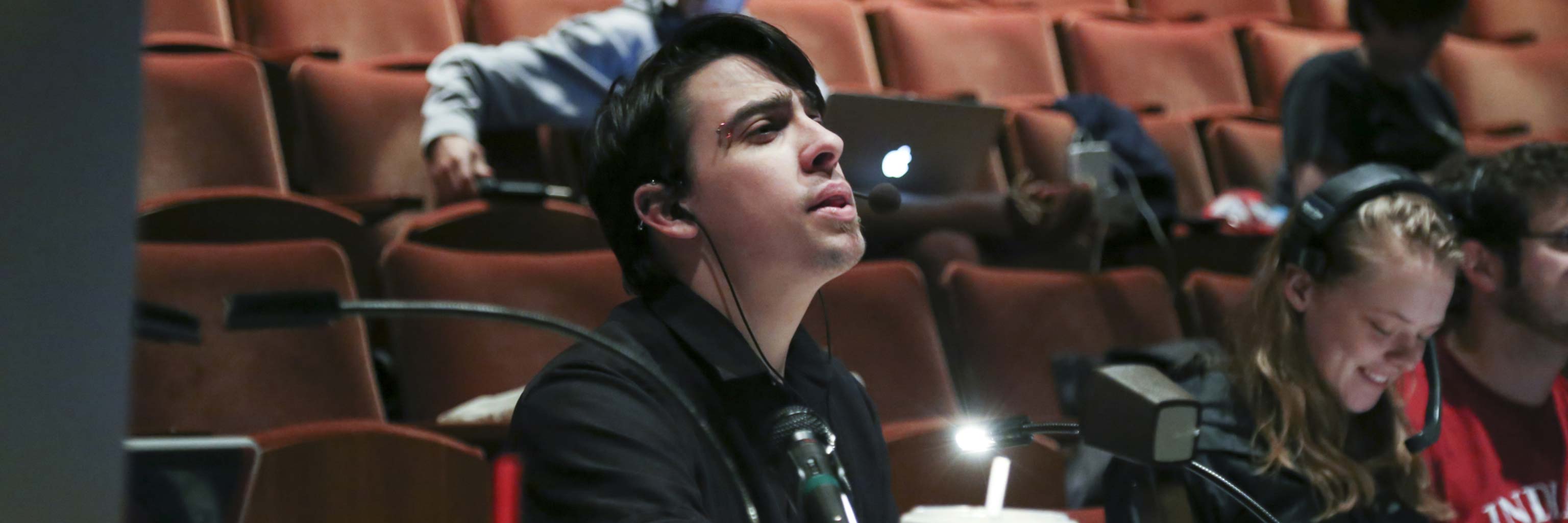 stage manager talking on microphone