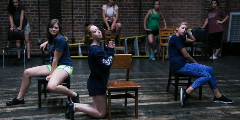 three women rehearse scene