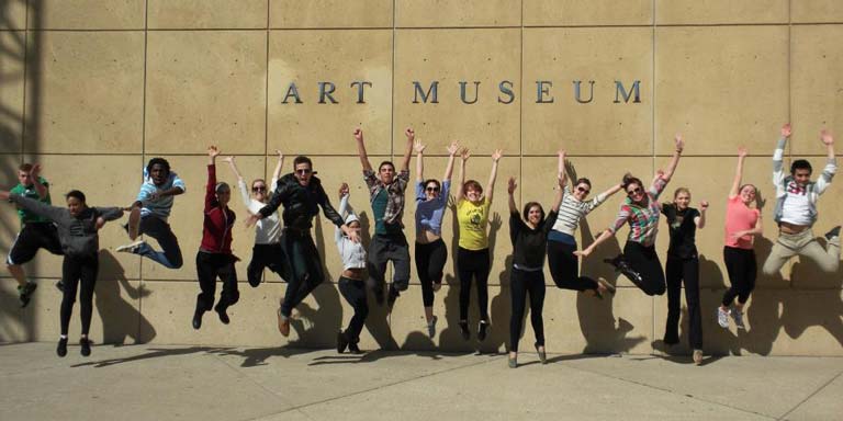 students jumping in the air